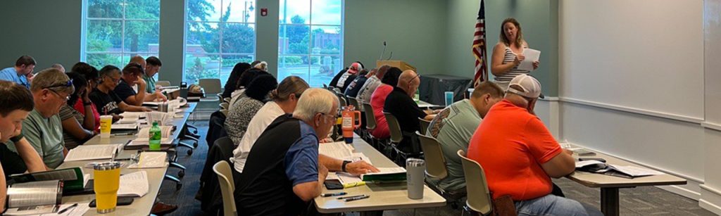 HSRC's Kristel Robison leads a CPS Technician training session.