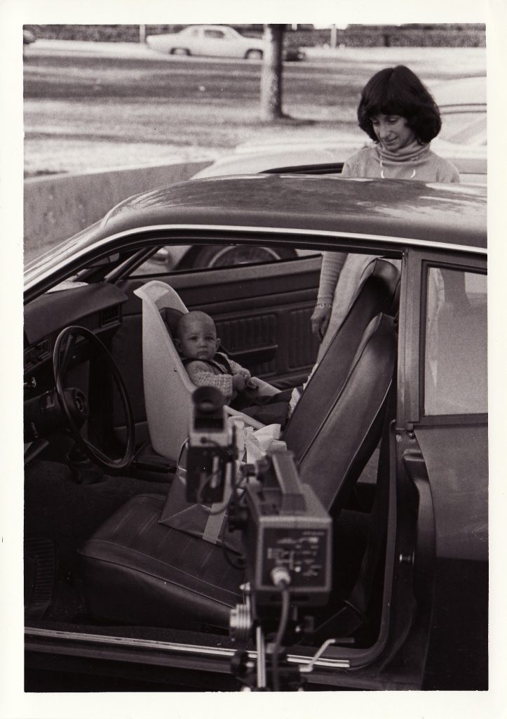 Lauren Marchetti checks a car seat.