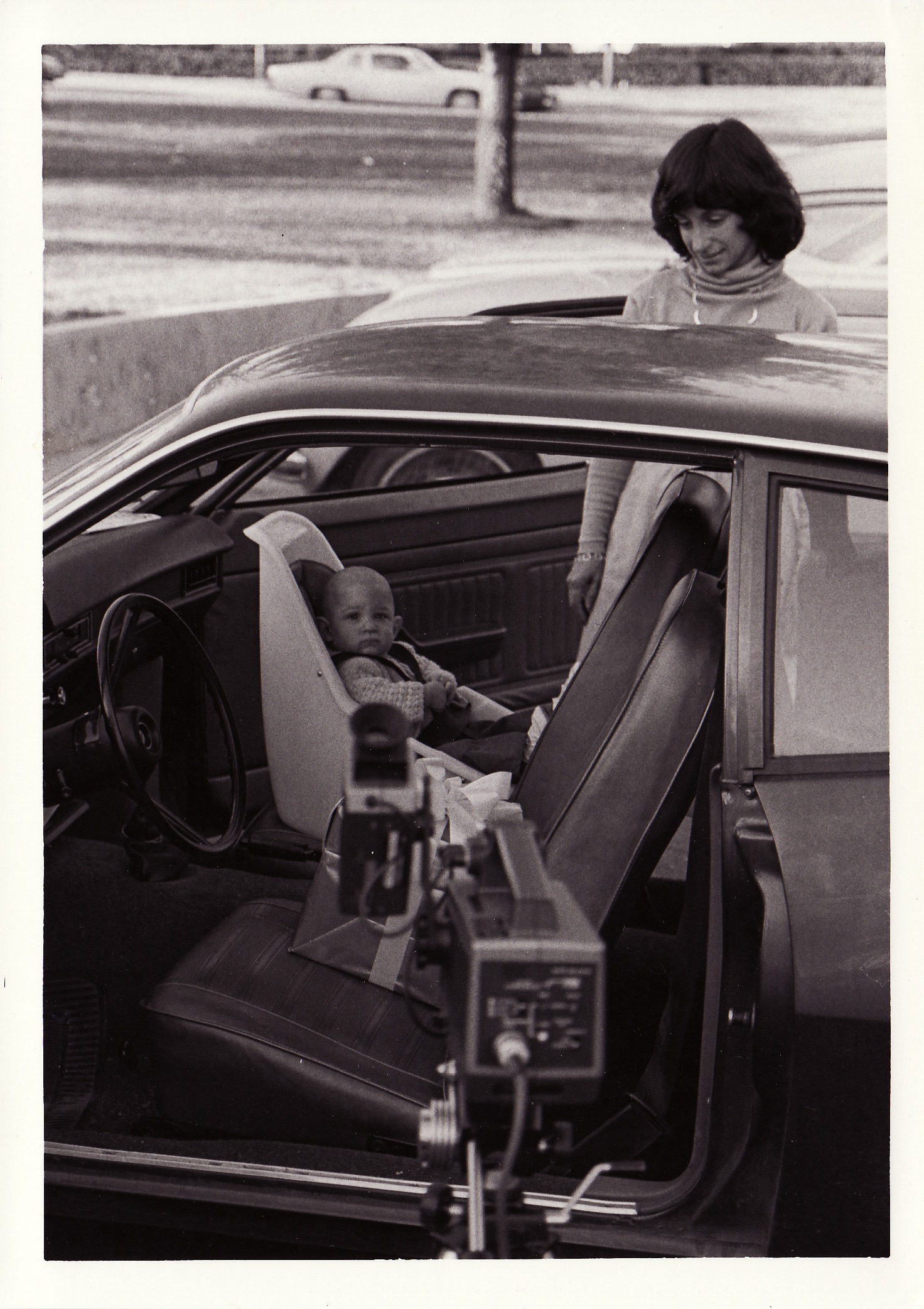 Lauren Marchetti checks a car seat in the 1980s.